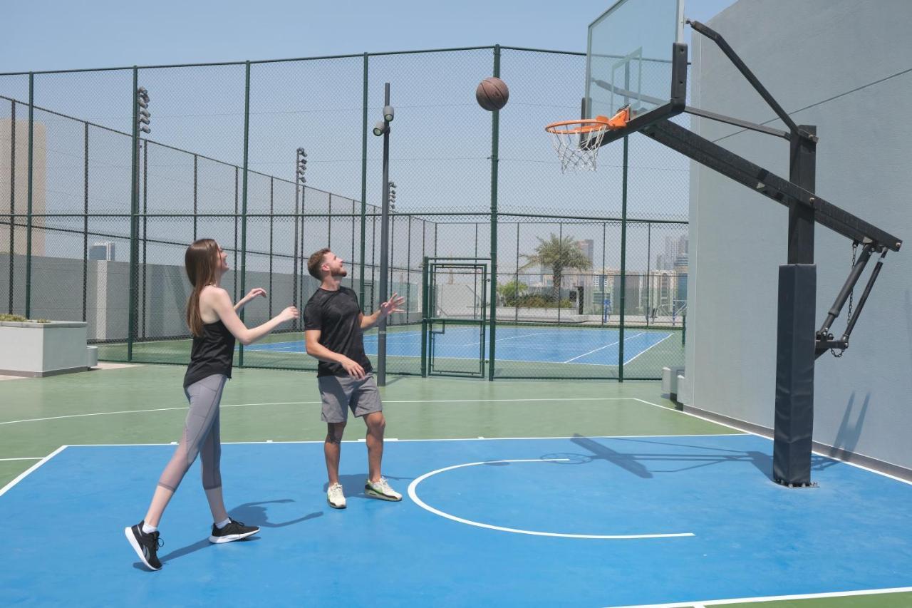 Отель Charthouse Bahrain Манама Экстерьер фото Basketball at the Dubai Sports Hub